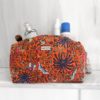 handcrafted cosmetic bag "orange palm"